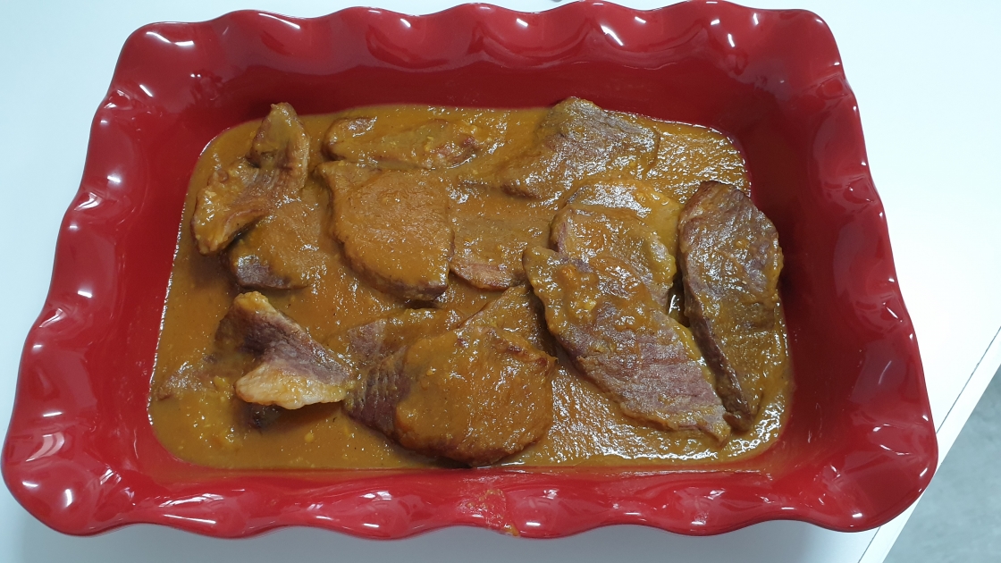 Presa de cerdo con salsa de mango